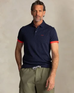 Marineblaues Poloshirt mit Blattmuster
