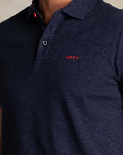 Marineblaues Poloshirt mit Blattmuster