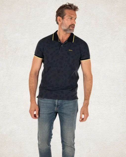 Marineblaues Poloshirt mit Blattdruck